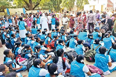 Students waiting outside the school when the bomb threat came