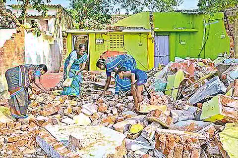 Women residents looking for domestic articles amid the rubble (Photo: Justin George)