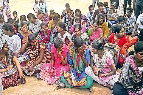 Students along with their parents sitting on a protest inside the siddha and naturopathy college