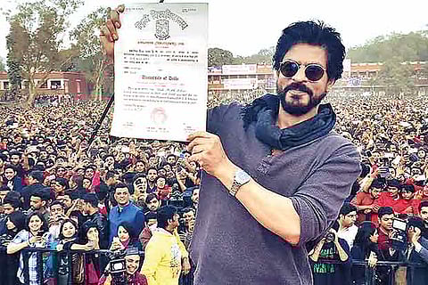 Shah Rukh khan with his degree certificate