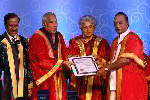 M.P. Sathiyavel Muruganar (extreme right) receives his PhD at the Bharath University
