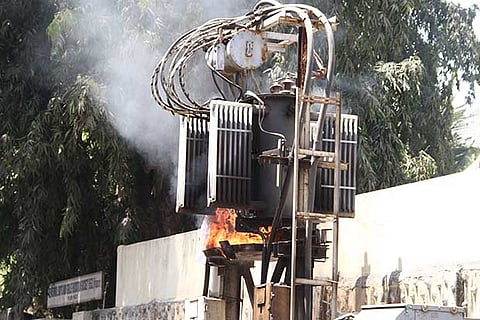 File photo of a transformer up in flames