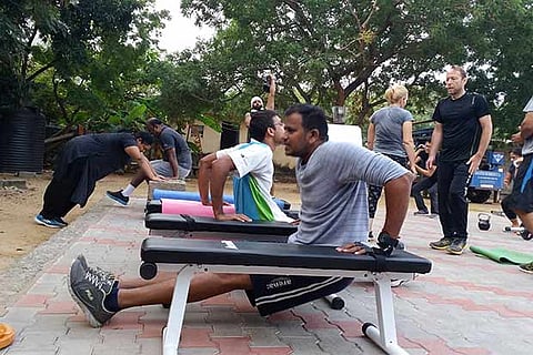 Members of Oval Crew engage in various forms of fitness exercises