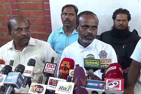Father Churchill (centre) with SAFF members addresses the media at Nagercoil on Monday