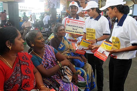 Students creating awareness about voting to people