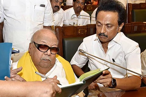 DMK chief M Karunanidhi signing the Assembly register after he became a member on Wednesday