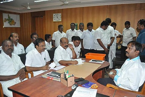 MLAs, TPM Mohideen Khan and ALS Lakshmanan during a meeting with Nellai Collector M Karunakaran