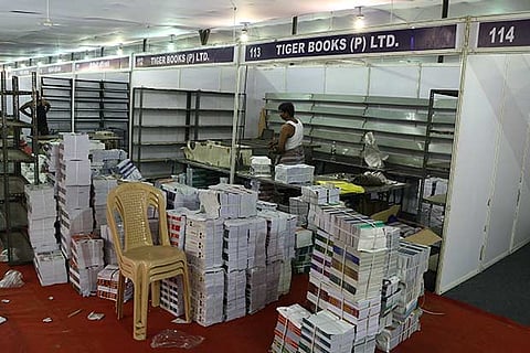 Final touches being given to the book stalls that are part of Chennai Book Fair (Photo: Prakaash)