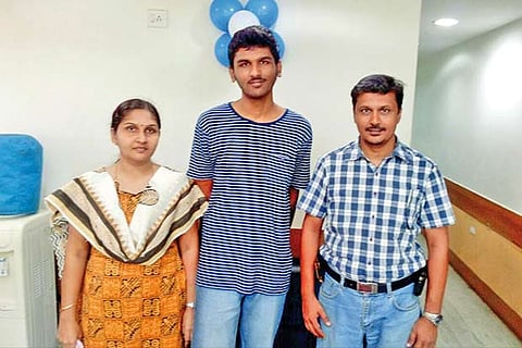 R Raghul, who came 73rd in IIT-JEE advanced, flanked by his parents