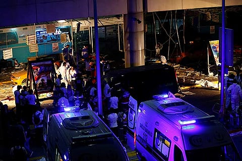 Forensic experts work outside Turkey's largest airport, Istanbul Ataturk, Turkey following the blast