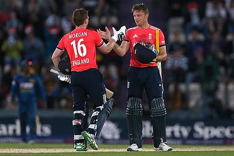 Jos Buttler (right) and Eoin Morgan after the match