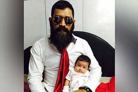 Mahendra Singh Dhoni with his daughter Ziva