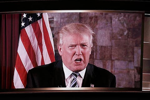 U.S. Republican Presidential Nominee Donald Trump is shown on a video monitor