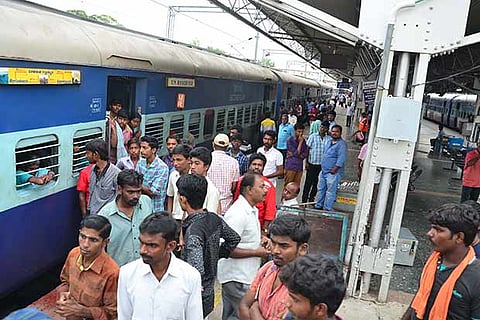 Passengers at the Madurai Railway Junction resorted to a rail-roko following delay in departure