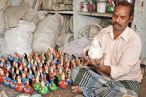 S Boopathy at work in his house in Mariammankoil village in Thanjavur district