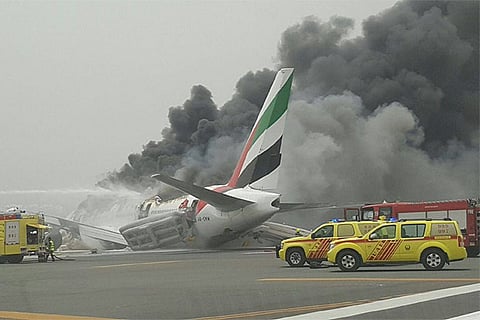 Emirates plane on fire at Dubai Airport (Image: Al Arabiya)