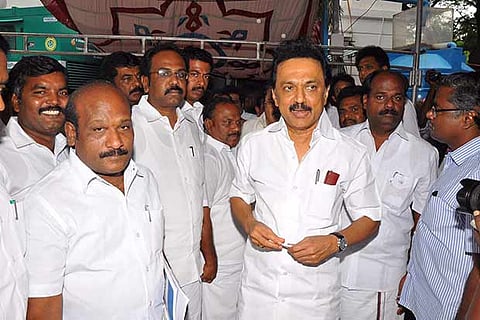 Opposition leader M K Stalin coming out of the House