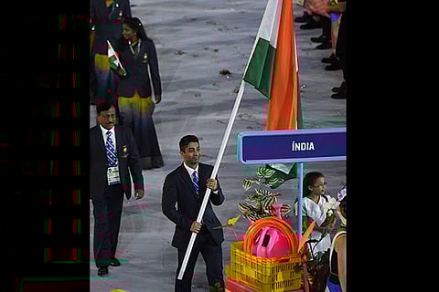 Ace shooter Abhinav Bindra carries the Indian flag at the opening ceremony of the Olympic Games