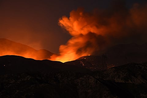 The Blue Cut Fire burns after sunset in the mountains near Wrightwood, California