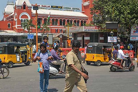 Pedestrians struggle to cross the junction in front of the Chennai Central