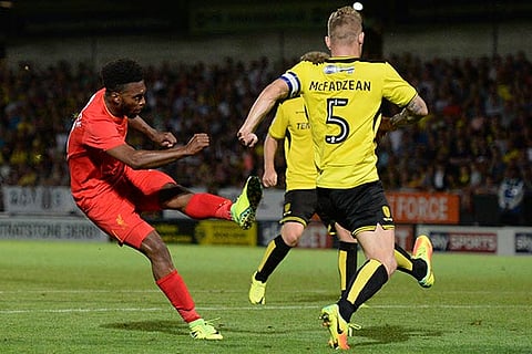 Daniel Sturridge (left) scores Liverpool?s fifth goal against Burton