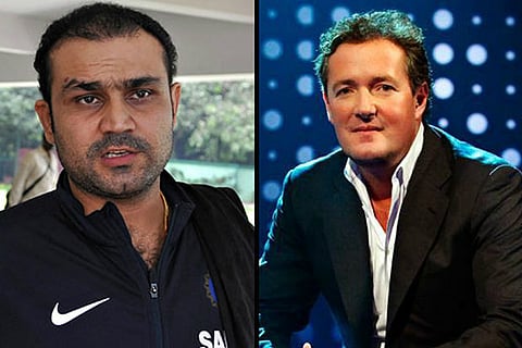 (L) Cricketer Virender Sehwag and (R) British journalist Piers Morgan