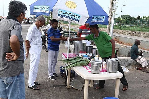 Walkers indulging in a healthy glass of aloe vera juice at the Marina