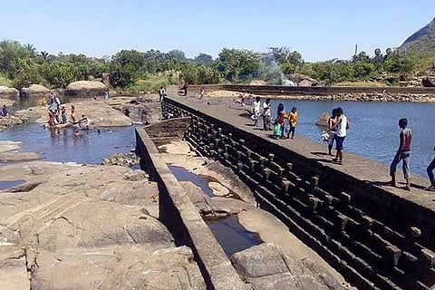 Despite four persons getting drowned, tourists continue to visit and take bath at Papanasam dam