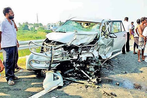 Mangled remains of the car