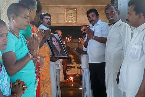AIADMK cadre across the state thronged temples and made a variety of offerings