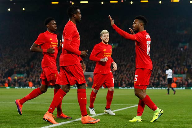 Liverpool's Daniel Sturridge celebrates scoring their first goal with teammates