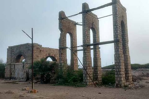 Roofless and shattered, an old railway overhead water tank supporting structure at Dhanushkodi