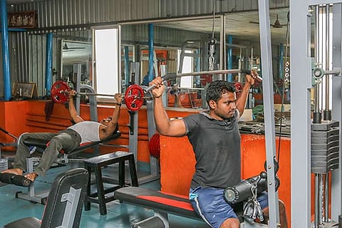 Young men working out at a Corporation-run gym in the city (Photo: Justin George)
