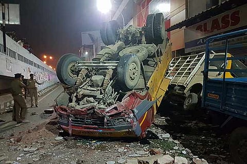 The lorry that rammed the parapet and fell off Anna flyover