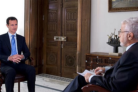 Syria?s President Bashar al-Assad attends an interview