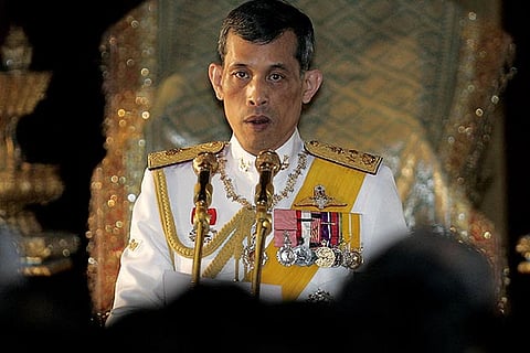 hai Crown Prince Maha Vajiralongkorn reading statements during the opening session of the parliament