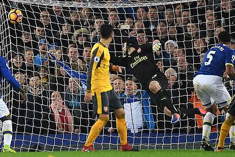 Williams (right) scores for Everton against Arsenal