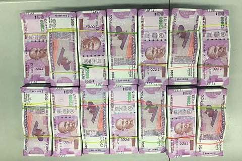 Rs 2,000 notes seized from five persons on GST Road