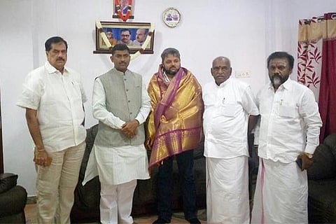 Praveen (Centre), grandson of MGR, who joined BJP along with his sister Smt.Leelavathi