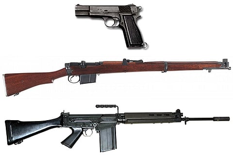 The above image shows a.9mm Browning pistol, Ishapore 2 A 1 rifle and FN-FAL rifle