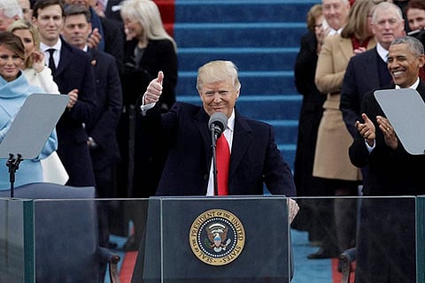 Donald Trump gives a thumbs after being sworn in as the 45th president of the United States