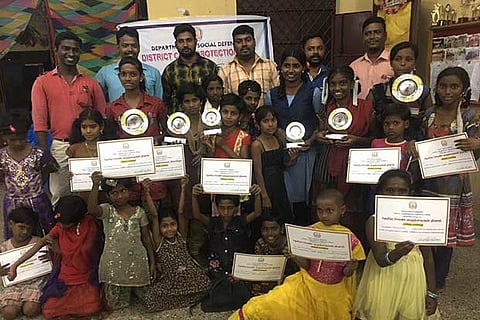 Children of Karunalaya in Royapuram with their certificates and medals at R-Day celebrations
