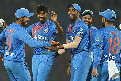 Indian players celebrate after beating England during the second T20