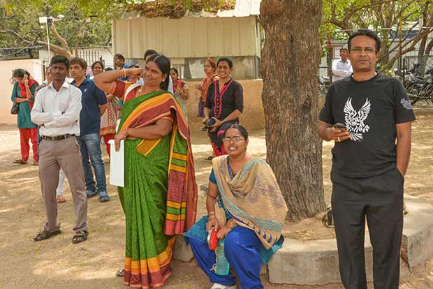 A file photo of parents anxiously waiting for their children outside an examination centre