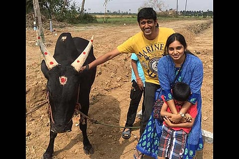 The couple at their farm, where they have been growing organic vegetables