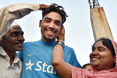 Mohammed Siraz with father Md Ghouse and mother Shabana Begum at his residence in Hyderabad
