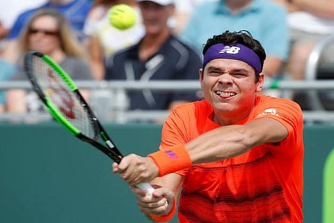 Canada?s Milos Raonic in action against Viktor Troicki