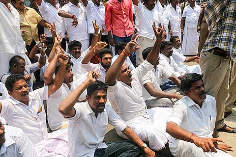 Supporters of Vijaya Baskar gathered outside his house in Iluppur to show their solidarity