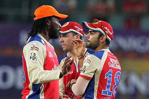 A file photo of Virat Kohli, Chris Gayle and AB de Villiers of RCB having a chat during the match