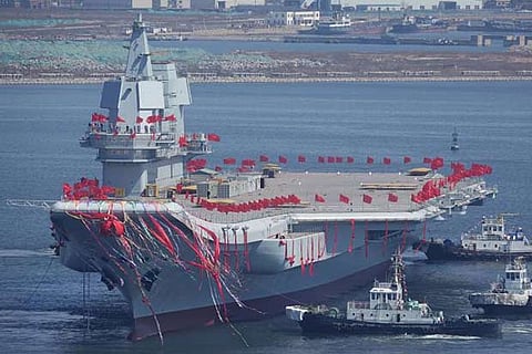 China launches first home-built aircraft carrier amid South China Sea tension